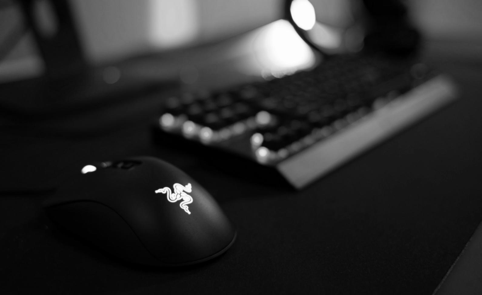 Cybersecurity professionals analyzing network traffic and firewall configurations in modern security operations center