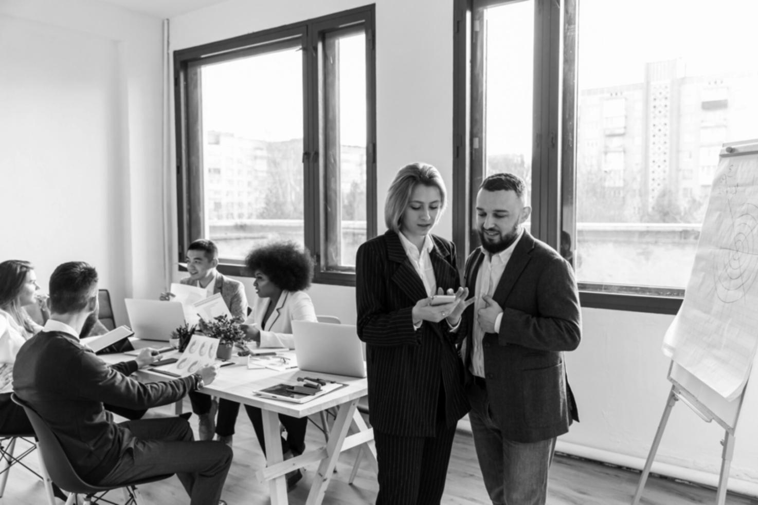 Students working on network security configurations in modern lab environment